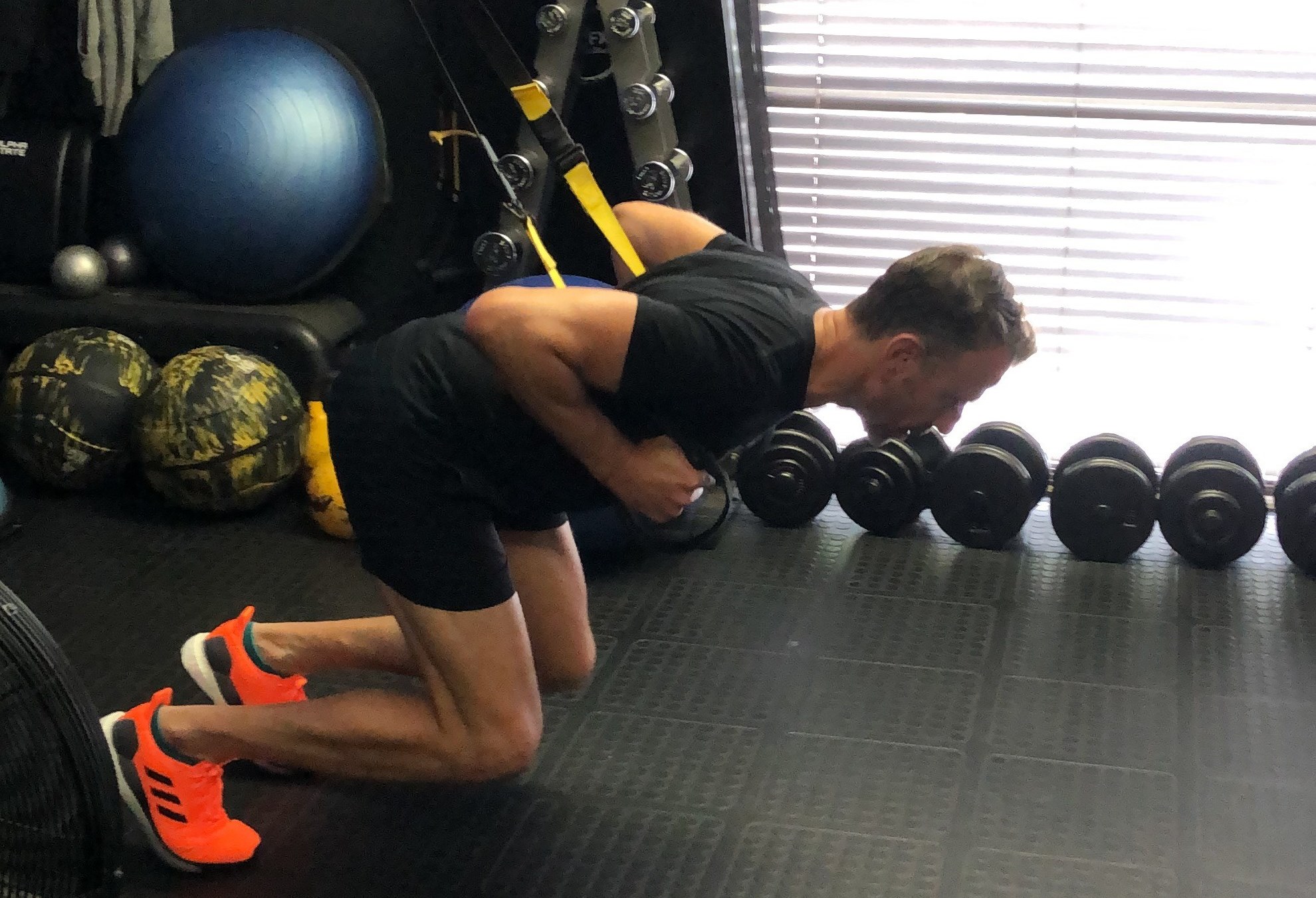 Man Doing TRX front squat